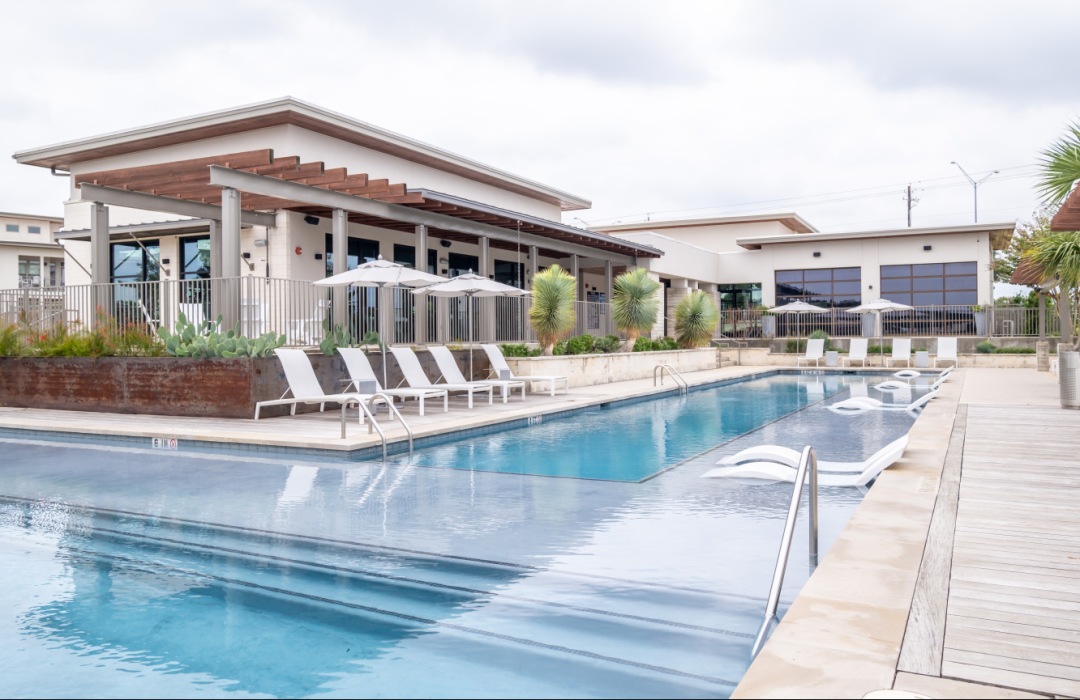 Large sparkling blue swimming pool 