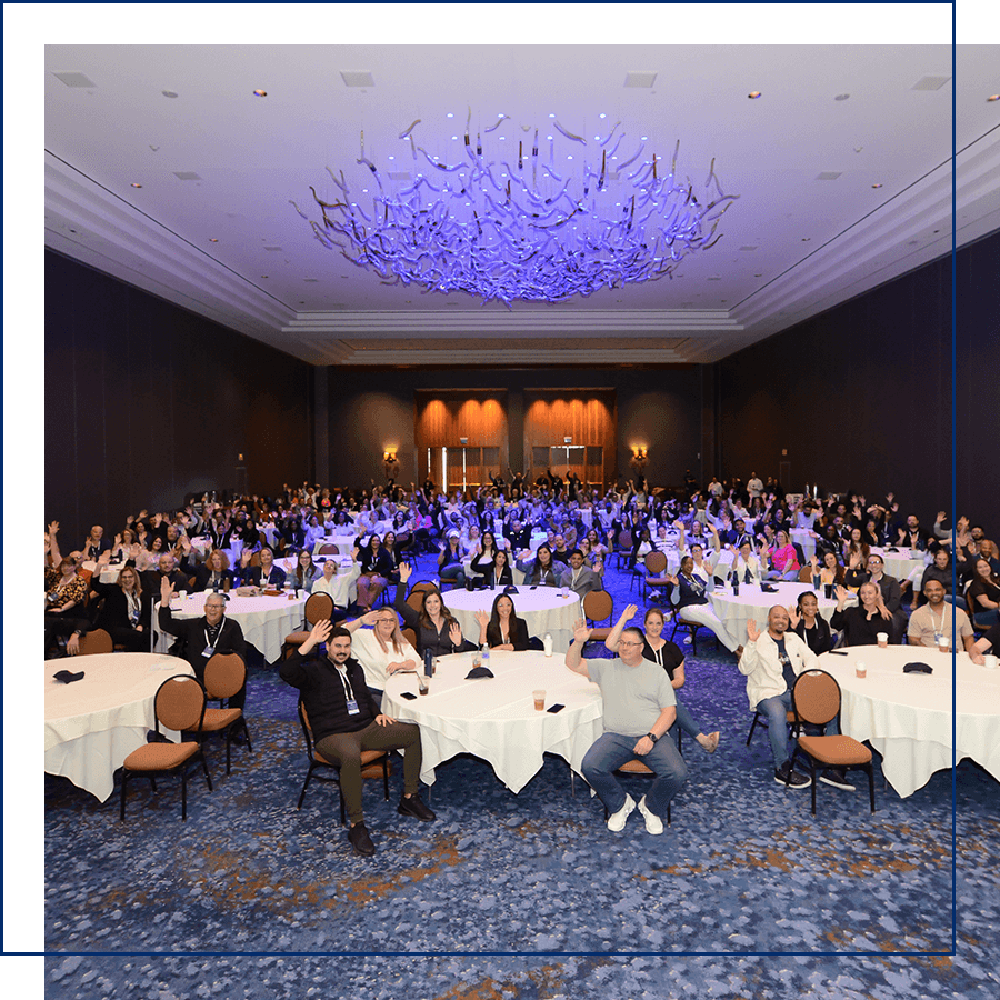 Employees sitting at tables 